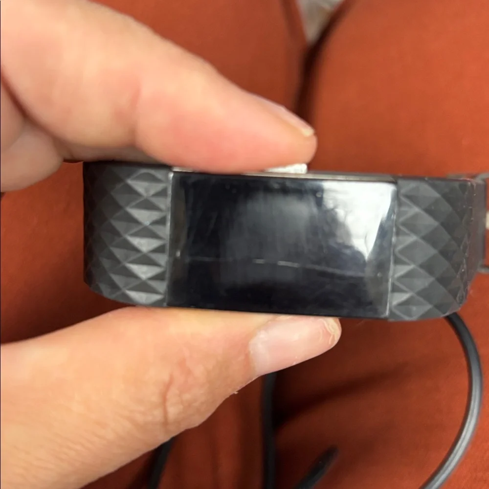 Black Fitbit Charge 2 with Charger